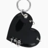Justine Clenquet Heart black patent charm Outlet