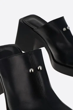 Justine Clenquet Raya black mules Online